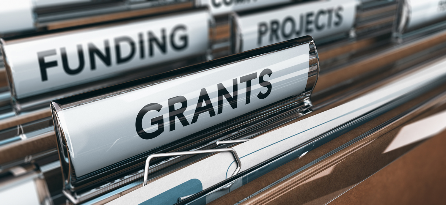 File folder tabs with text "Funding," "Projects," "Grants."